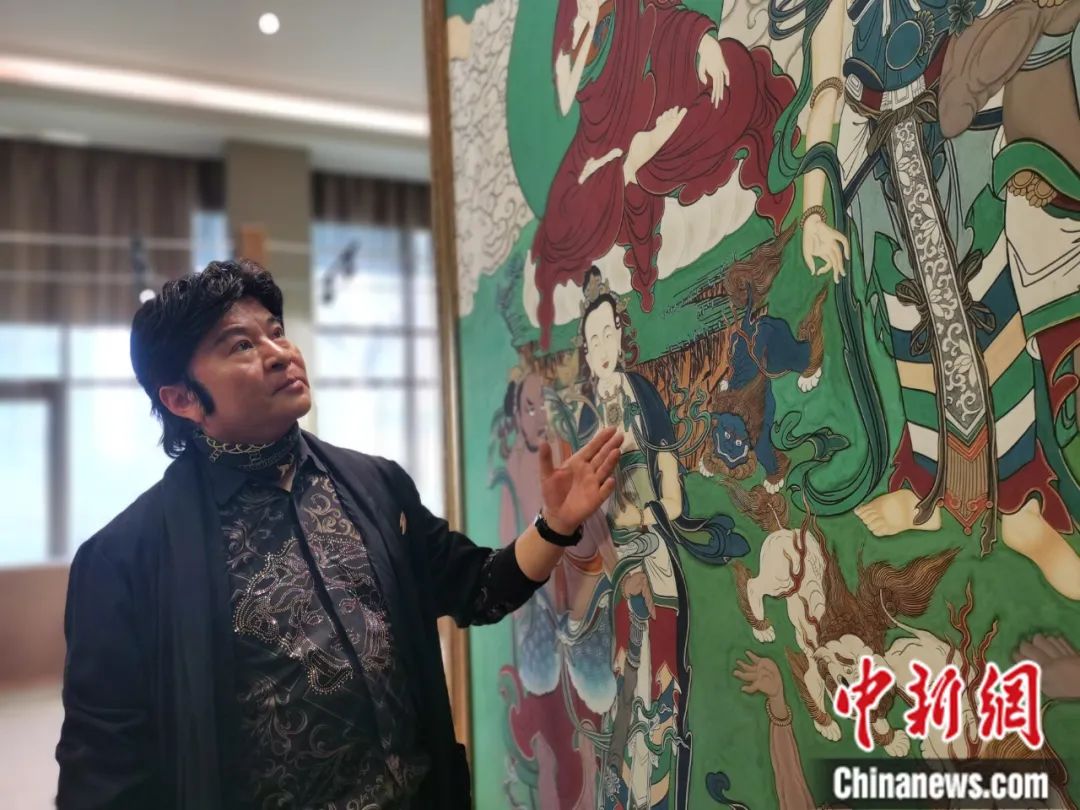 國家一級美術師劉觖。張?zhí)砀?攝